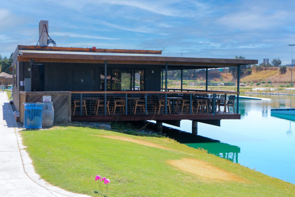 The Costa Fuego lakefront patio at Velocity Island Park
